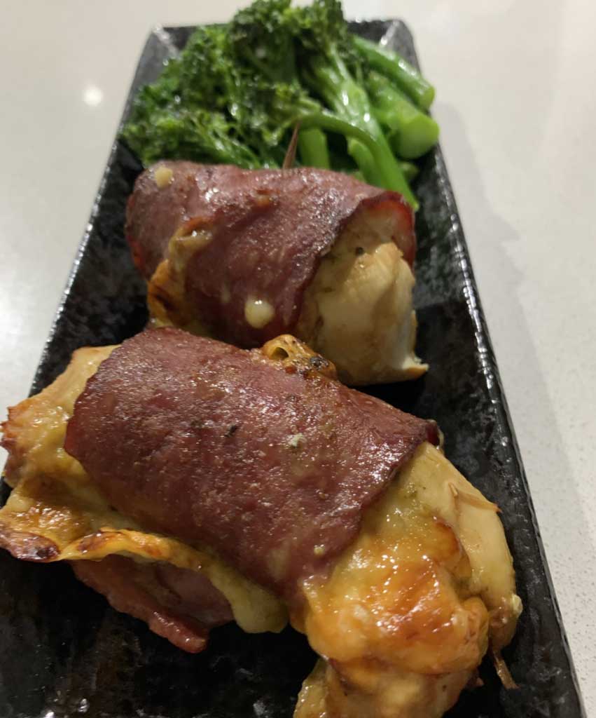Air fried chicken breast wrapped in bacon
